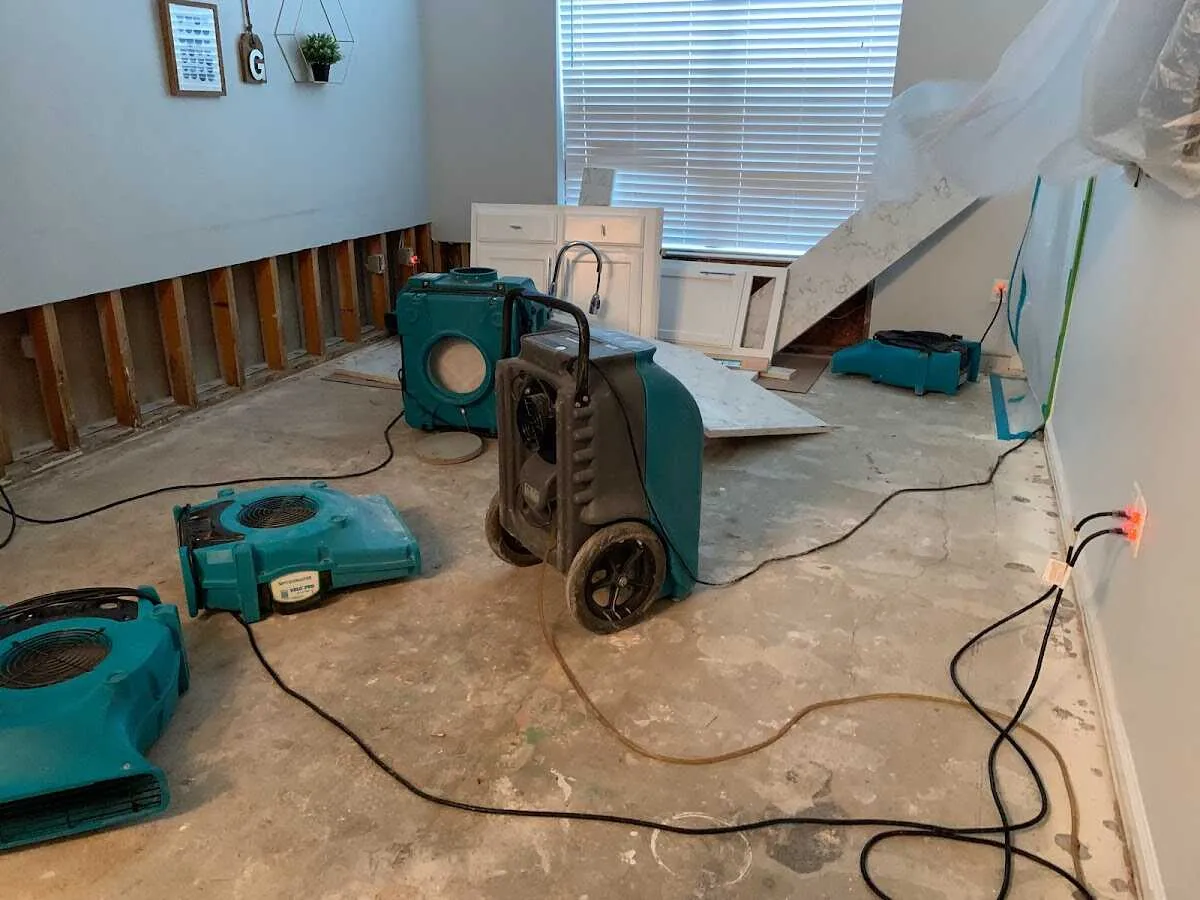 Dehumidifier in flood-cut room for Water Damage Restoration in Accokeek